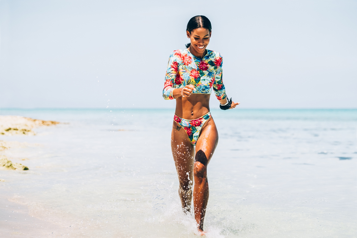 Young Black woman at tropical beach